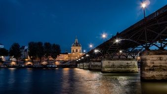 seine river bridge at night