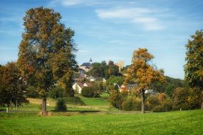 panorama of trees and autumn village in Germany