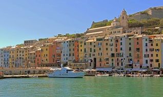 view from the water of colorful houses in porto venere