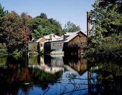 houses and their reflections in the pond