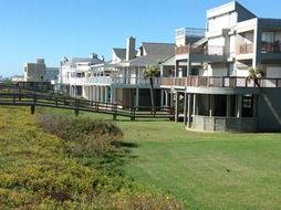 architecture of the dream house on a green lawn