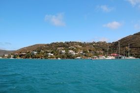 buildings at hill, seashore