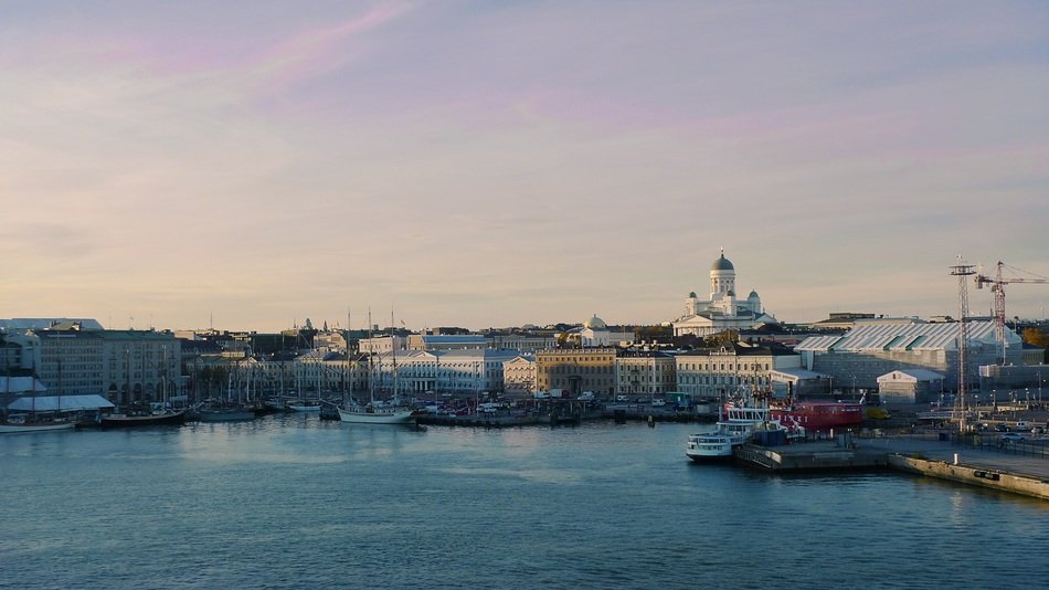 panoramic view of harbor in helsinki at dusk