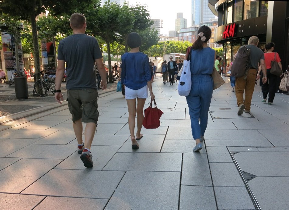 people walk along the pedestrian zone in the metropolis