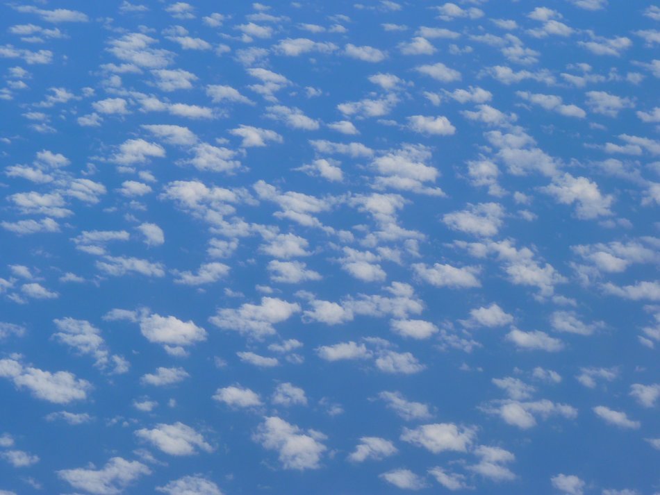 white clouds in the blue sky