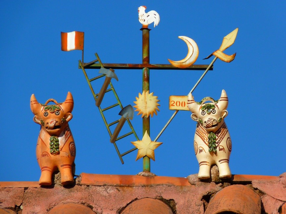 ceramic bulls on the roof