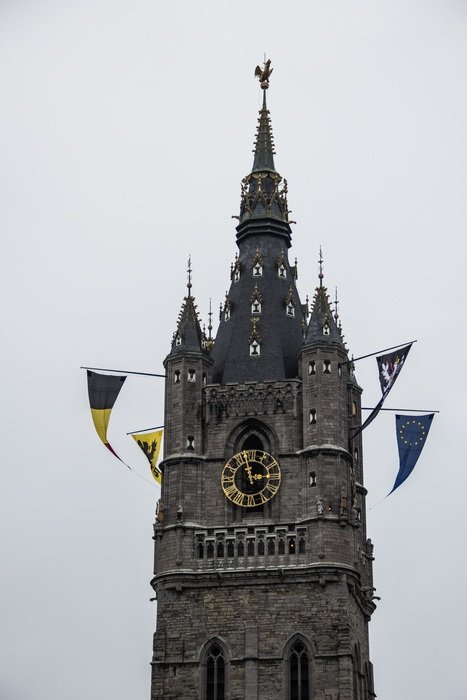 belfry of ghent with flags