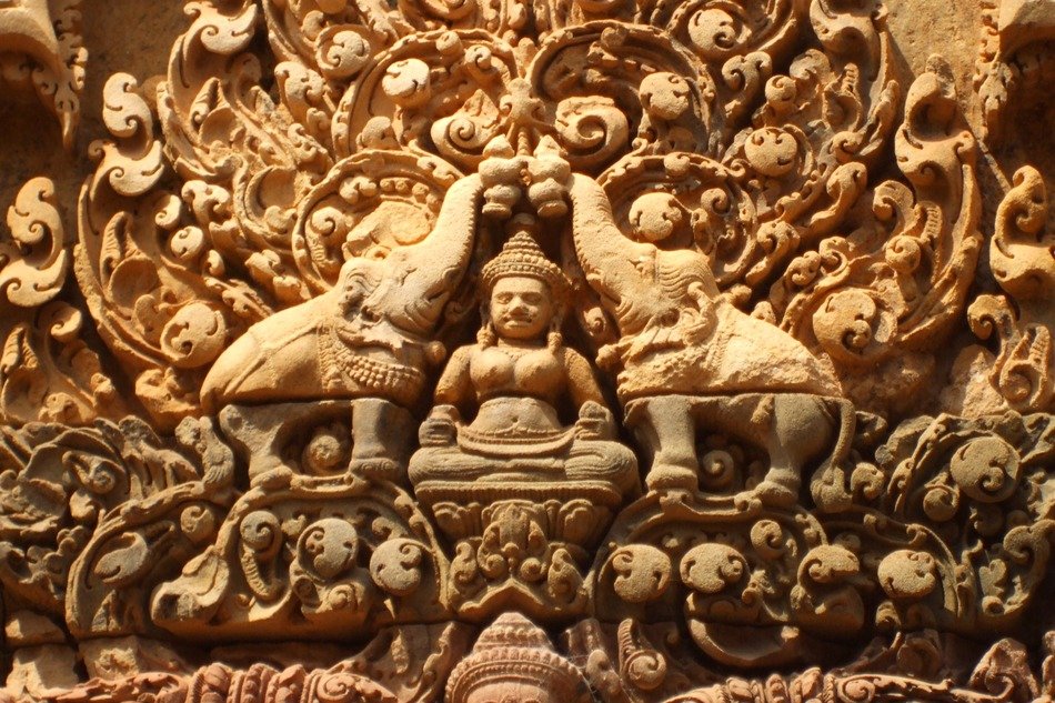 Stone carving on the walls of Angkor Wat temple