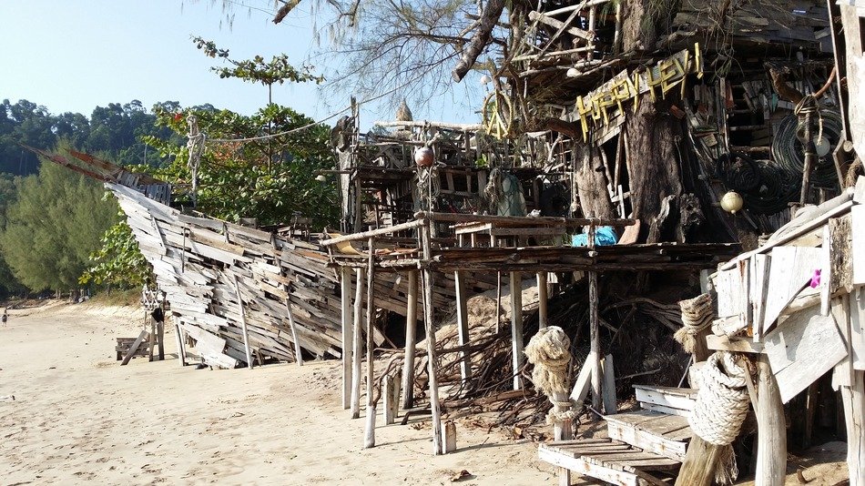 bar made of flotsam on the beach in Thailand