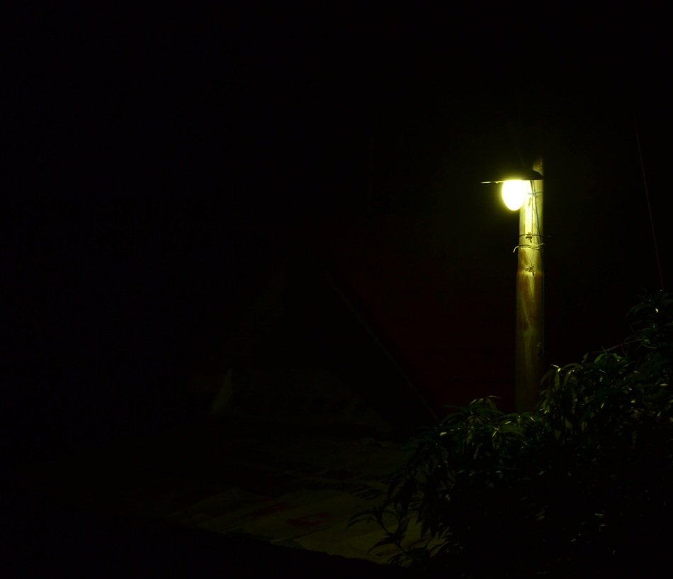 street lamp on the house in the dark