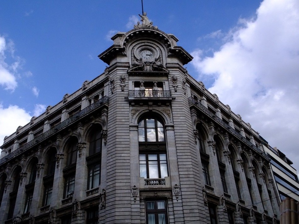 clock on the corner building