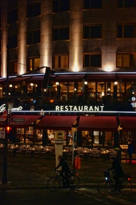 facade of a restaurant in berlin at night