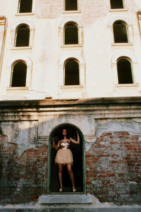 girl in the doorway of the building