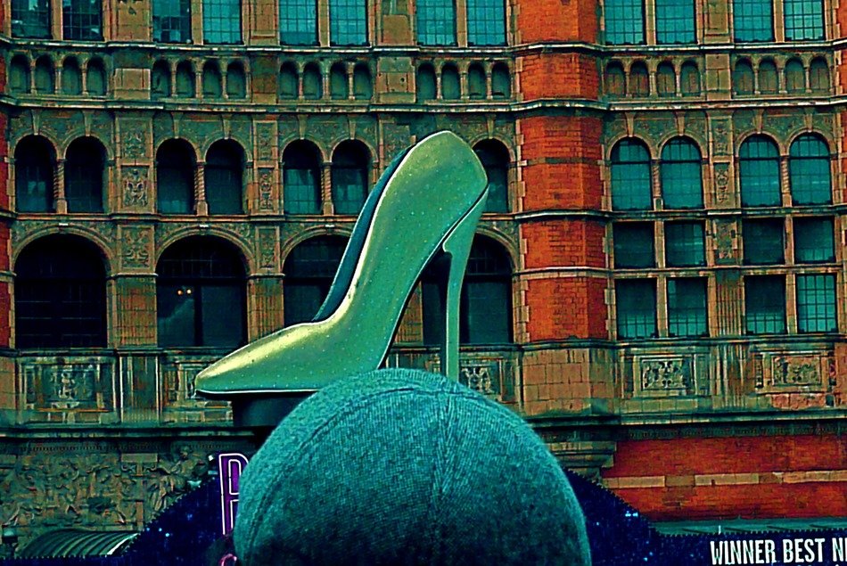 women's shoe in the architecture of the city