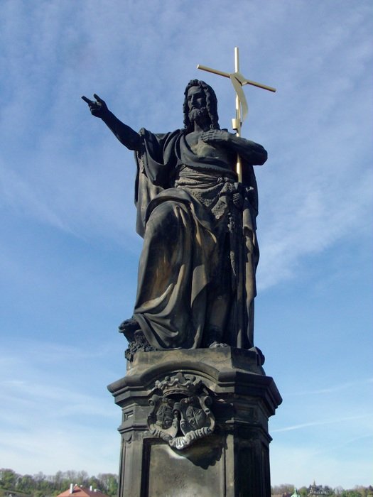 christian cross prague statue