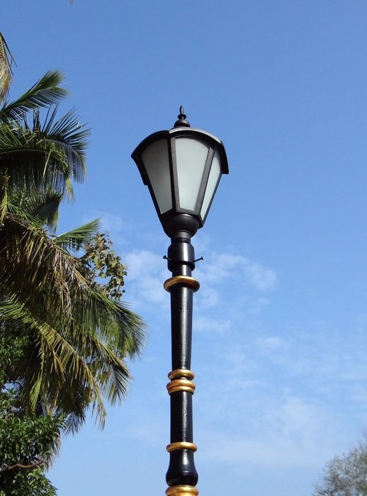 Lamp post against the sky