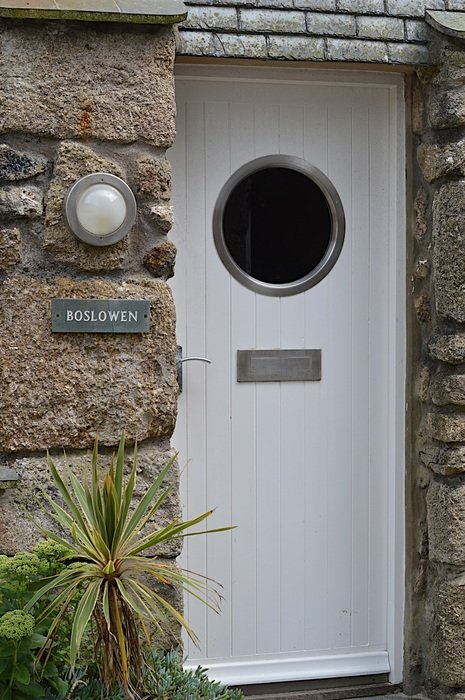 white door with round window