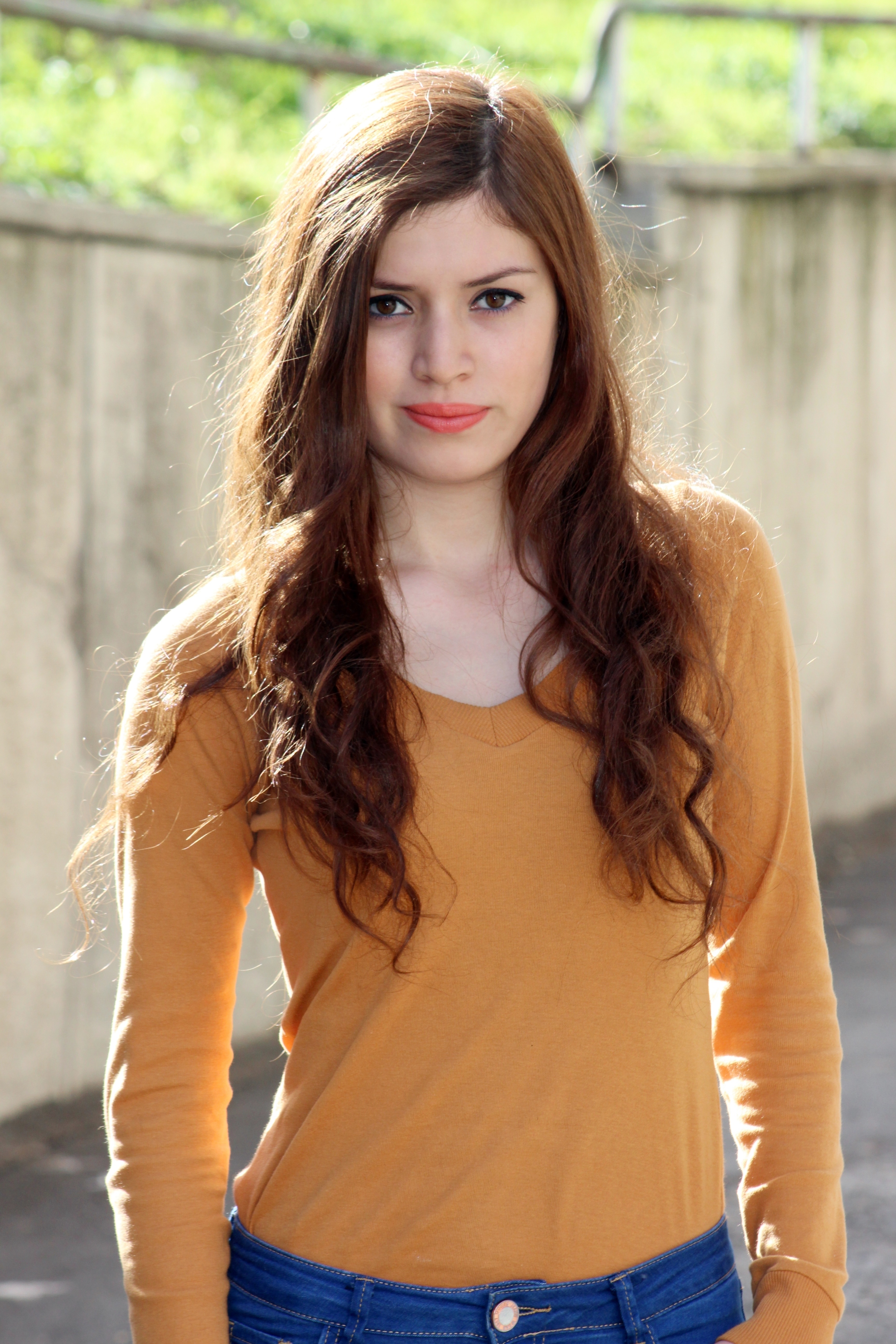 File size: 3Mb, girl with long hair in a sweater and jeans picture with tag...