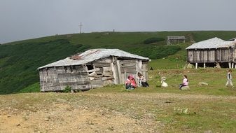 old wooden huts in the mountains