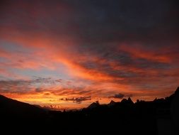 awesome sunset afterglow on cloudy sky