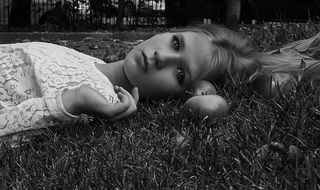 black and white picture of a girl and apples