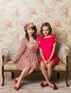girls in spring dresses in a photo studio