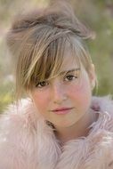 Portrait of pretty girl in fur