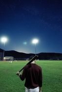 baseball player with bit on field