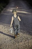 young fisherman walking away
