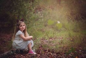 attractive beautiful child in forest