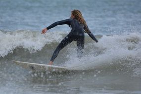surfer waves man