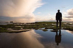 silhouette of man water landscape horizon