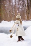 little girl walking on a snow