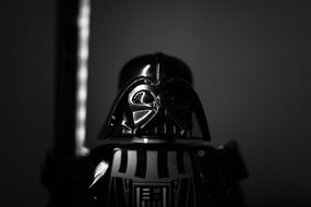 figurine of a warrior on a dark background