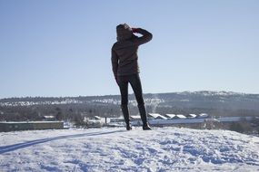 photo of the girl is on a snow