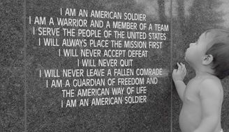 child standing and looking at soldier's creed