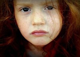 portrait a cute girl with red hair