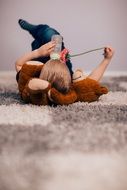 baby is lying on a carpet
