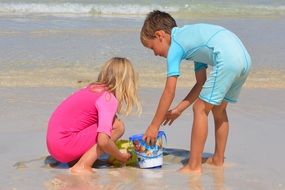 children playing with sand