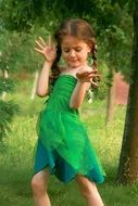 little girl in a green dress