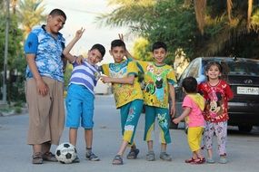 young boys playing with a ball