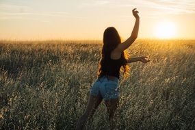 back long heared girl sunset view