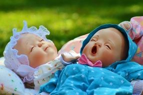 cute doll with sleeping faces