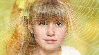 human child girl portrait blond face view cobweb