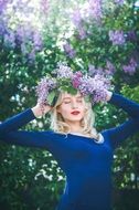 portrait of girl with a wreath on the head of a lilac