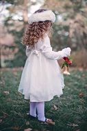 girl dressed for christmas celebration