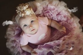 baby in a lace dress