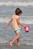 child with bucket