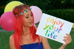happy girl with wreath and pink hair