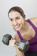 woman doing exercise with weight